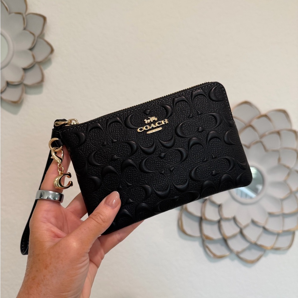 Coach Embossed Black Wristlet with charms
